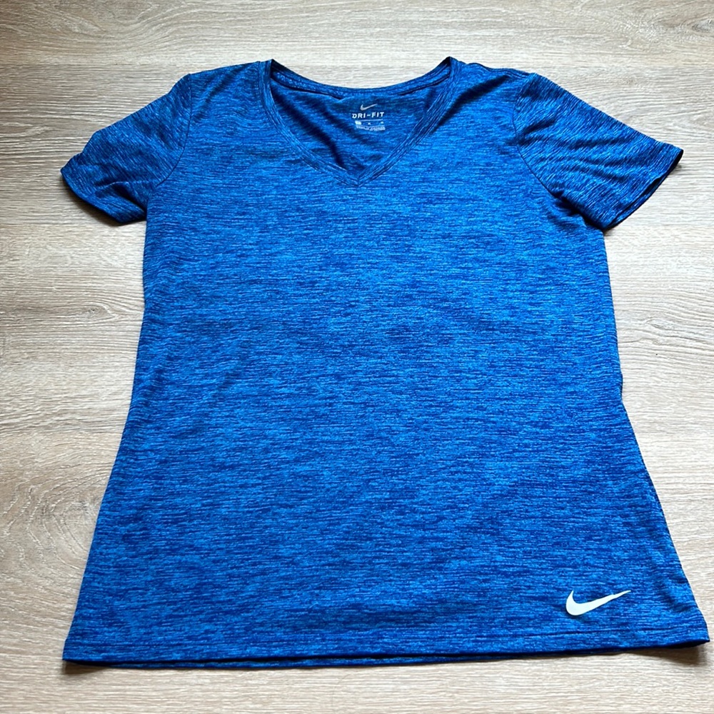 Women’s royal blue Nike dri- fit top